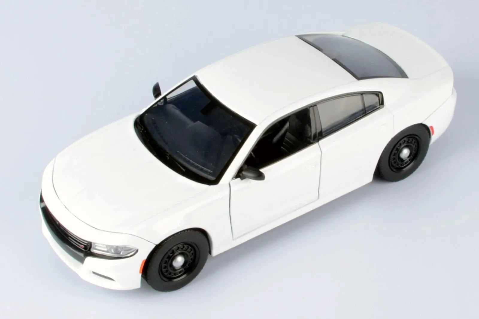 Motormax 76810W — 2023 Dodge Charger Pursuit Police Car White "Custom Builder's Kit - Law Enforcement and Public Service" Series 1/24 Diecast Model Car by Motormax